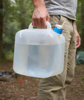 Person holding Foldable 10L Water Containers 2 Pack With Spigot And Pouch For Camping, Hiking And Emergency Prep BPA Free Durable Outdoor Water Jug