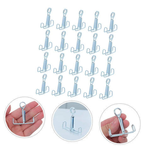 25 Piece Laboratory Rubber Tube Clamps For Flow Control With Spring Loaded Latex Hose Water Stop Clips And Flat Jaw Sealing Clamps, shown in hand for size reference.