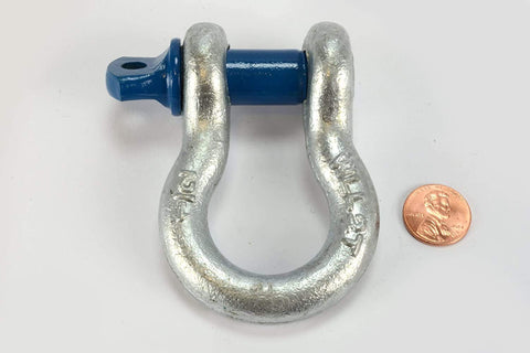 2 Ton D Ring Bow Shackle With Screw Pin Clevis Half Inch Pin Forged Steel Hot Dip Galvanized Finish WLL 2 Tons next to a penny