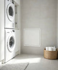 Heavy Duty Steel Access Panel For Drywall With Sleek Flush Mount Design No Sweat Push To Open next to washing machine in modern laundry.