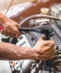 Mechanic using 3/8 Inch Drive Impact Socket Set, 49 Piece 6 Point SAE and Metric, Chrome Vanadium Heat Treated Sockets on car engine