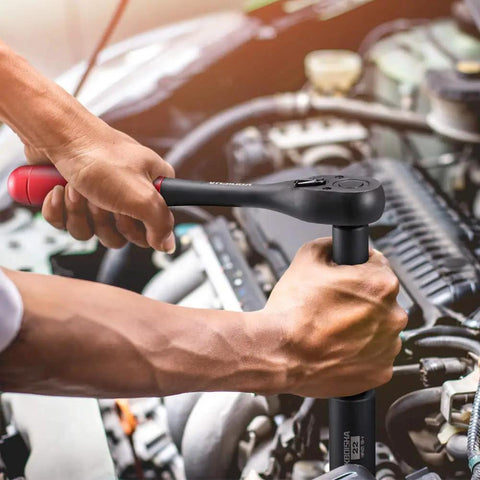 Mechanic using 3/8 Inch Drive Impact Socket Set, 49 Piece 6 Point SAE and Metric, Chrome Vanadium Heat Treated Sockets on car engine