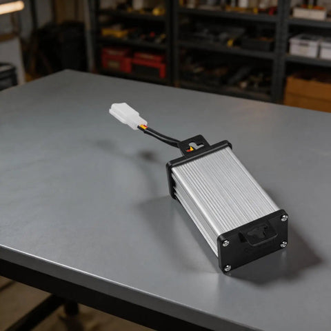 Heavy Duty DC Voltage Step Down Converter Swaps 36V Or 72V Straight To 12V with compact design on a workbench.