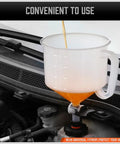 Slick No Drama Spill Proof Coolant Funnel Kit With Universal Adapter Bleeder pouring coolant into a car's reservoir.
