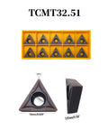 Ten TCMT32.51/32.52 triangular carbide turning inserts with center hole in a yellow rack; 16 mm size, 3.97 mm thick.