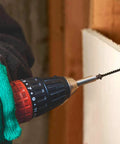 Built Like A Tank Number 8 X 1-1/4 Inch Black Phosphate Coated Stainless Steel Truss Head Wood Screws 100 Pack Heavy Duty Self Tapping drywall fasteners being installed with a power drill.