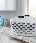 1.5 Bushel Portable Laundry Basket With Flexible Design Durable Build And Easy One Hand Carry Handles in laundry room