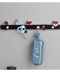 Wall Mounted Rustic Wood Coat Rack With Dope Key Storage Hooks keeps your gear neat with colorful hooks and scissors displayed.