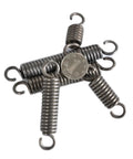 Extension Compression Springs Kit With 1.2mm Wire Diameter And 12mm Outer Diameter next to a coin for size reference.