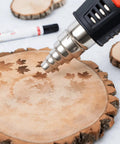 Powerful 1500 Watt Heat Gun for Crafting and Wood Burning, Dual Temperature, fine tip nozzle engraving maple leaf design on wood