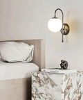 Upgrade Your Vibe With Sleek Brass Wall Sconces Featuring Handcrafted White Glass Globe Shades Ideal For Modern Farmhouse And Bedroom Lighting E27 Socket, showcasing wall sconce next to bed.
