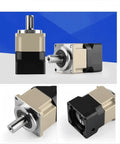 Heavy Duty Pgh90 Planetary Speed Reducer Gearbox With Straight Shooting Precision And Zero Wiggle Room Helical Teeth Design, compact black and beige housing with output shaft.
