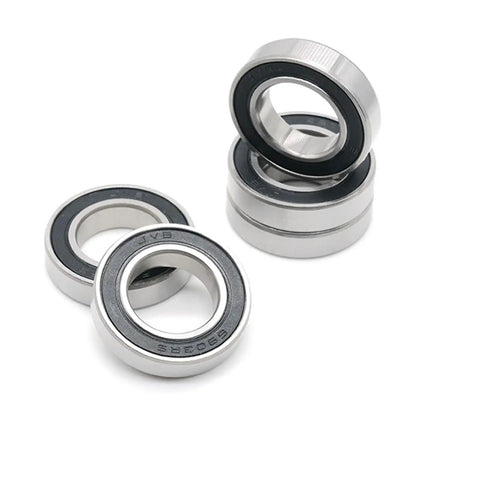 Set Of Ten 6902RS Deep Groove Ball Bearings 15X28X7Mm With Rubber Seals And ABEC 7 Precision Steel Material arranged on white
