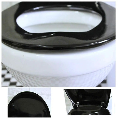 Built Tough Matte Black Resin Toilet Seat With Super Quiet Slow Close Hinges, close-up view highlighting the smooth finish.