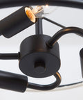 Close-up of black metal frame on Dope Modern Drum Chandelier Pendant Light With Black Metal Frame And Fabric Shade For Kitchen Island.