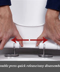 Close-up view of hands pressing quick release mechanism on Round Slow Close Toilet Seat Crafted From Amethyst Druse Resin.