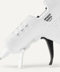 Detail of white hot glue gun kit with 30 sticks, 20W high temp, drip free nozzle for arts and crafts, DIYers and school projects.