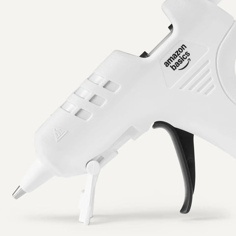 Detail of white hot glue gun kit with 30 sticks, 20W high temp, drip free nozzle for arts and crafts, DIYers and school projects.