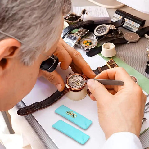Watchmaker using Timepiece Cleaning Putty For Watches Pro Grade Dry Clay Bar on watch movement parts with tools.