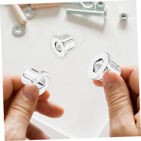 Hands holding Pro Grade Stainless Steel Dowel Pin Set With Centering Pins For Precise Woodworking Alignment Cabinet And Bookshelf
