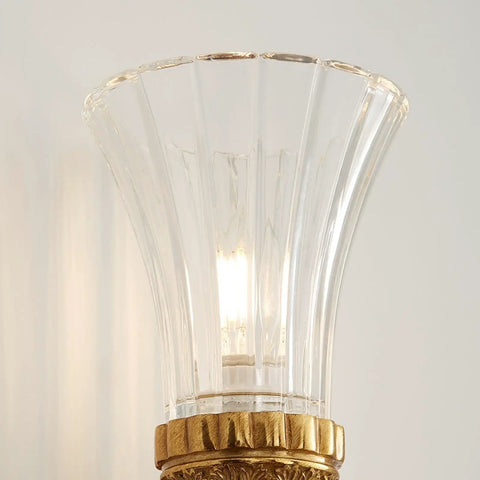 Solid Copper Wall Sconce Clear Textured Glass Shade Matte Black With Brushed Gold Trim Heavy Duty Indoor Lighting Fixture For Primary Bedroom Living Space Hallway Entryway Straight Fire Glow, close-up of textured glass shade.