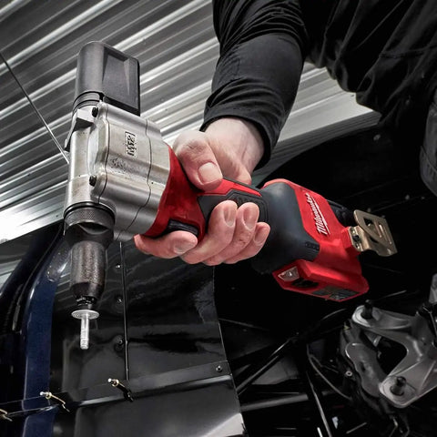 Hand using M12 Cordless Rivet Tool Kit for No Fuss Riveting on Aluminum, Steel And Stainless Rivets