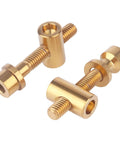 Hella Durable Grade Five Titanium M5x30mm Bolts With Smooth Flat Washers And Secure Hex Nuts in shiny gold finish.