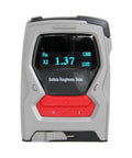 Portable Digital Surface Roughness Gauge Pro Grade Tool with High Precision 0.01μm for Ra Rz Rq Rt Testing, Reads 0.05-10 μm Ra and Rq, Perfect for Precision Machining, QA, and Metallurgy. Front view of handheld gray and red surface roughness tester showing Ra 1.37 μm on display