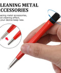 Person holding Drilling Cleaning Pen With Fiberglass Brush And Precision Abrasive Stick for cleaning metal accessories.