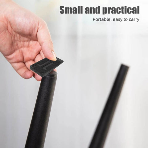 Hand holding 20 Pack Black Adjustable Furniture Leveling Pads Anti Slip Shims for furniture stabilization