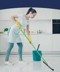Woman cleaning kitchen floor with 4 Pack Double Foam Floor Squeegee For Concrete And Industrial Floors, Heavy Duty Stainless Steel Scrubber With EVA Foam Blade, 18 Inch Wide, Great For Garage, Pool Deck, Windows And More.
