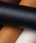 Roll of Self Adhesive Leather Repair Patch 54x20 Inch Peel And Stick Easy Fix Leather Tape showing texture and variety of colors.