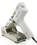Portable 110V 50Hz 100W Desoldering Gun With Vacuum Pump on stand, showing side view and sturdy base for PCB repairs.