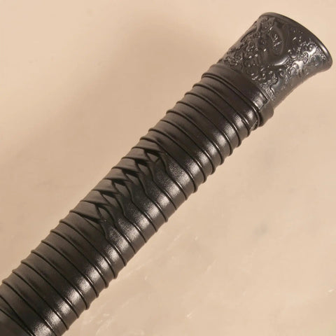 Close-up of handle on Heavy Duty Polypropylene Practice Sword For Martial Arts Training With Durable One Piece Blade And Sheath Safe.