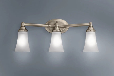 Eva 3 Light Brushed Nickel Vanity Light With Frosted Glass Dual Mount Bath Fixture shown on gray wall