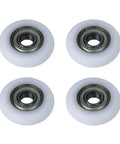 Slick Rolling 10x40x10mm Bearing Pulley With 6000ZZ Spherical Roller Nylon And Rubber Wheels Heavy Duty 4 Pack viewed from above.