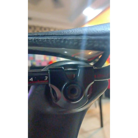 Close-up of Seatpost Saddle 7x9 Clamp Ear With Titanium Bolt Kit For Carbon Rails Upgrade on bike seat, CNC aluminum detail