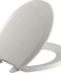 Q2 Round Closed Front Toilet Seat With Quick Release And Easy Install in Lustra Tender Gray Durable Polypropylene shown opened