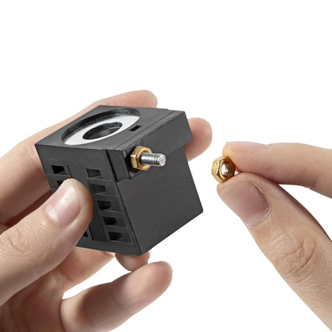 Person holding Replacement 10V DC 25W Solenoid Coil For Hydraulic Power Unit Lift Dump 10226-33 Universal Fit Easy Install