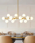 Mid Century Modern Sputnik Chandelier With 16 Lights Brushed Brass Arms And Frosted Milk Glass Shades For Kitchen Or Dining Room, elegant design over dining table.