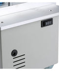 Close-up of Ultra Compact Mini Electric Table Saw With Slick Angle Guide And Quick Lift Blade control switch, indicating power options.