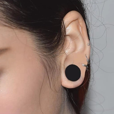 Black Silicone Ear Gauges 25mm 1 Inch Tunnels Plugs Set For Ears Stretching Kit shown in ear, highlighting soft non-toxic material