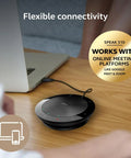 Speak 510 Portable Conference Speaker near laptop for meetings and calls with USB or Bluetooth connectivity