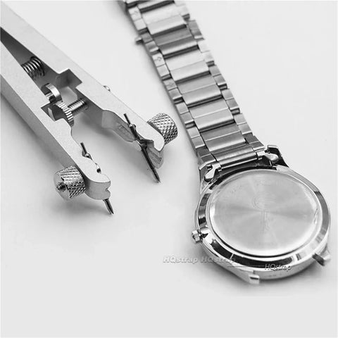 5 Piece Watch Repair Kit For Bands And Spring Bars, Pin Remover Tool next to a watch band, durable metal precision tool for repairs