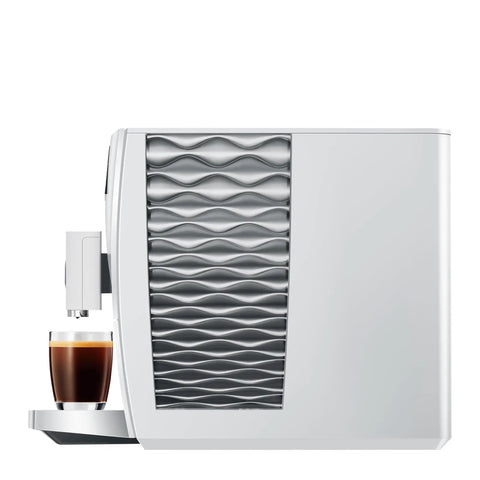 Piano White Super Automatic Coffee Machine With Pro Aroma Grinder And Pulse Extraction Tech For Straight Barista Quality Crema, side view with espresso.