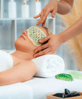 Cooling Jade Eye Masks And Hair Comb Set 4 Piece Facial Massage Tools For Puffiness Relief And Relaxation Jade Stone Eye Masks With Scalp Comb Gua Sha Style Beauty Tools For Home Spa Chill Self Care, woman using jade eye mask