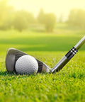 Close-up of a golf club with Premium.370 Inch Iron Ferrules For Taper Tip Golf Shafts, 12 Pack With Black And Double Chrome Ring on grass