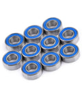 Flanged 5x11x4mm Deep Groove Ball Bearing 2RS Steel With Double Shield Seals arranged in a compact group