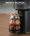 AIEVE XL Espresso Cooling Ball, stainless steel 2-pack, used to chill iced coffee in a glass carafe on a coffee machine