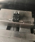 Badass Strength Precision Vise Stop Locators For CNC Milling Machines mounted on steel vise for accurate part positioning.